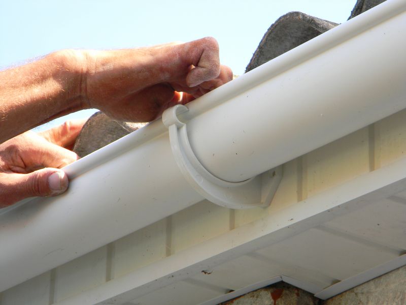 Gutter Installation on Roof Edge